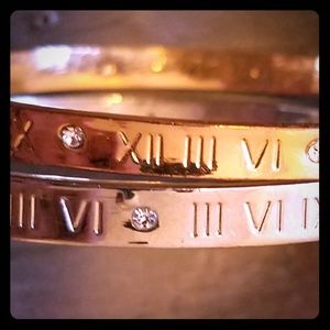 2 name brand gold and silver bracelets